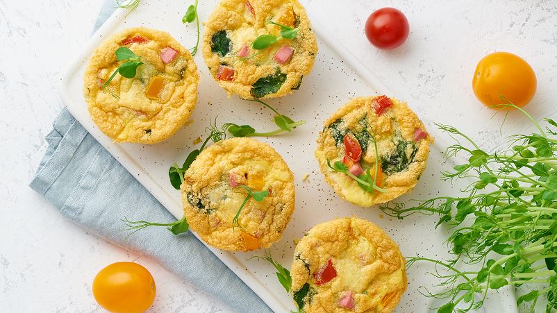 Mini omelet bites with ham and vegetables for breakfast